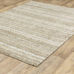 8' X 10' Ivory Grey Tan And Brown Abstract Power Loom Stain Resistant Area Rug