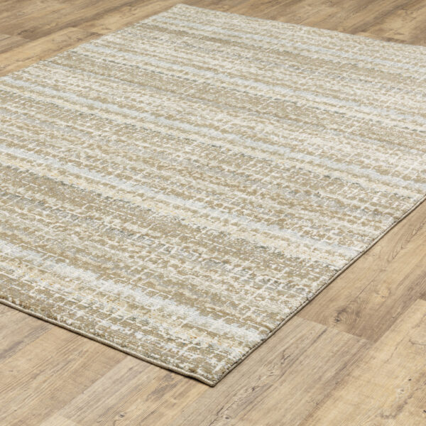 8' X 10' Ivory Grey Tan And Brown Abstract Power Loom Stain Resistant Area Rug