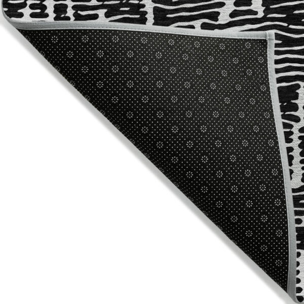 5' X 8' Black And Ivory Abstract Washable Indoor Outdoor Area Rug