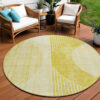 8' Wheat Gold And Ivory Round Geometric Washable Indoor Outdoor Area Rug