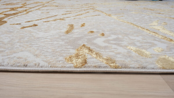 5' x 8' Ivory and Gold Abstract Area Rug