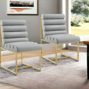 Set of Two Tufted Gray And Gold Upholstered Faux Leather Dining Side Chairs