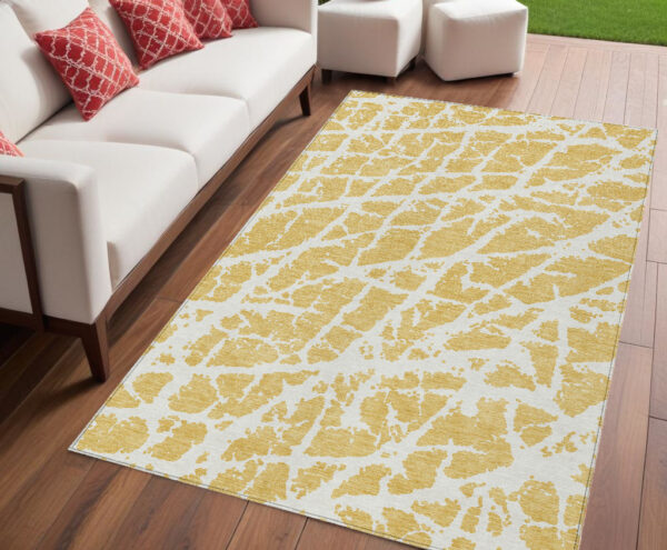 5' X 8' Gold and White Abstract Washable Non Skid Indoor Outdoor Area Rug