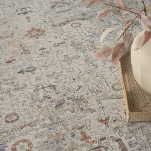 8' x 10' Ivory Blue and Orange Oriental Power Loom Distressed Area Rug With Fringe