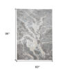 5' x 8' Gray and Ivory Abstract Power Loom Area Rug