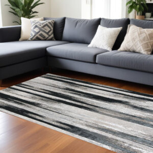 7' x 10' Black Silver and Gray Abstract Power Loom Area Rug